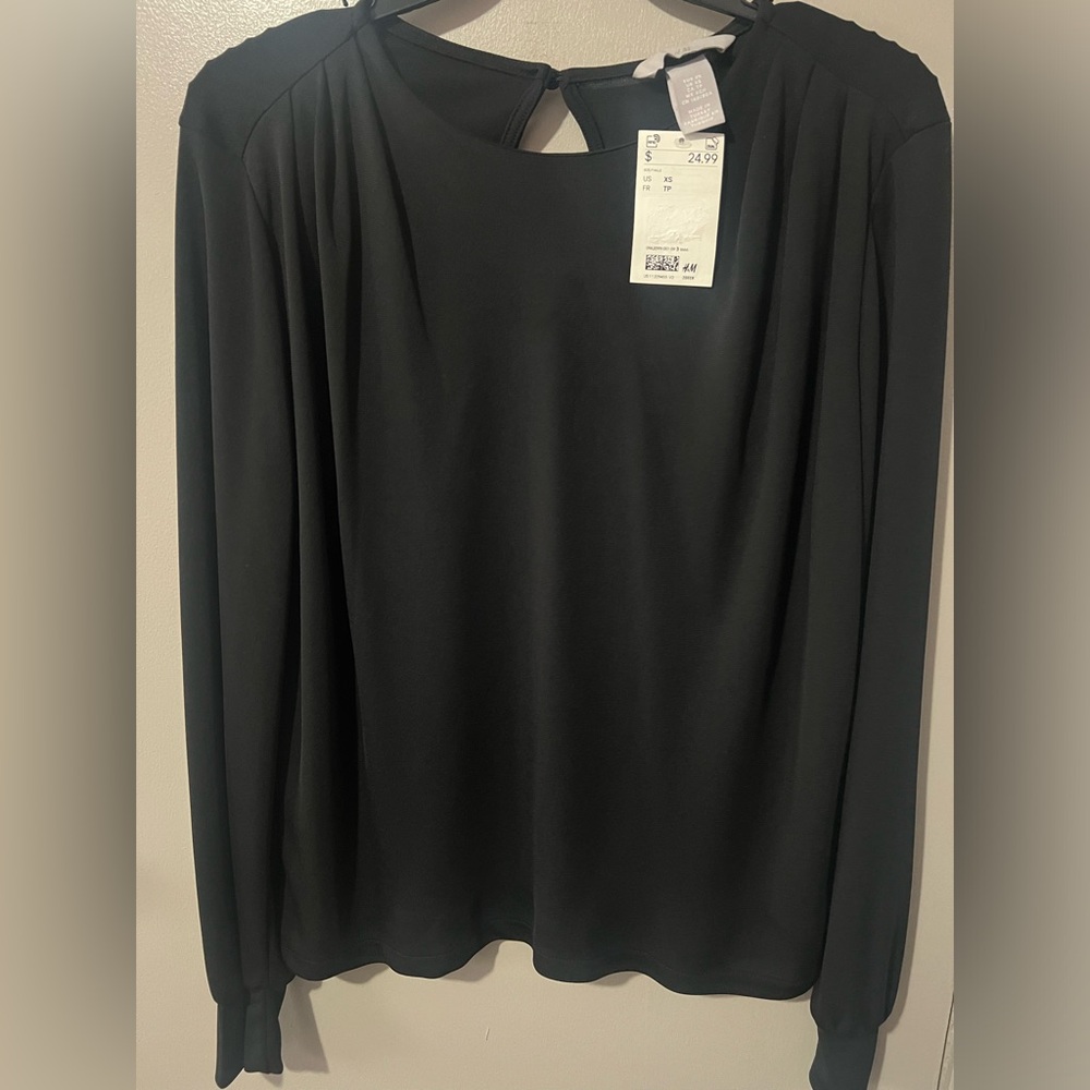 X small, black shirt long sleeve. 100% polyester, Casual shirt